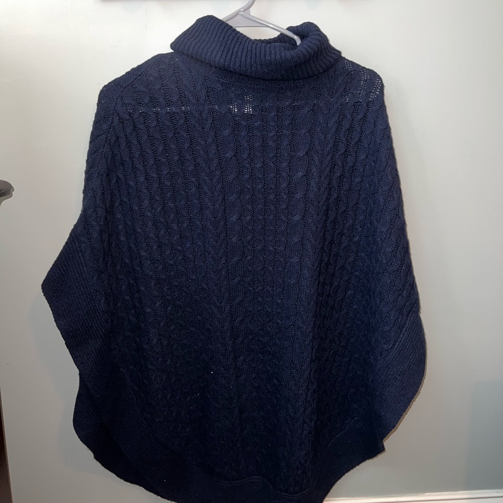 Women’s navy coverall/poncho.